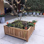 Planter hardhout vierkant in de tuin
